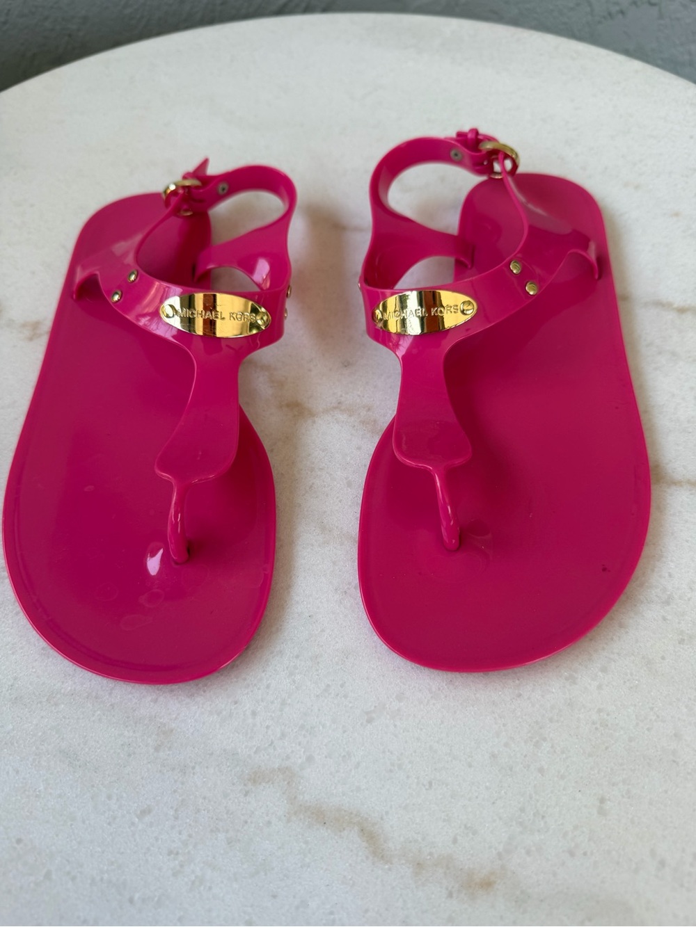 Michael Kors Hot Pink Jelly Thong Sandals with Gold Plaque